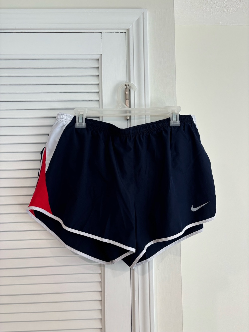 Nike Women's Navy Athletic Shorts with Red and White Trim